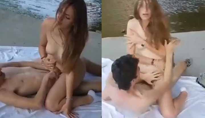 [America] Horny couple caught having sex on the beach, caught on camera in the middle of passionate lovemaking.